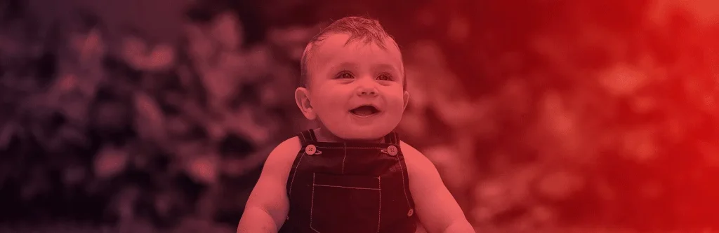 Smiling baby, banner of the Bébé9 Magento 2 and Hyvä migration