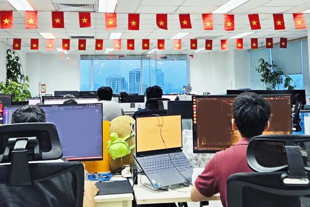 The Sutunam open space in Hanoi seen from behind, with Vietnamese flags