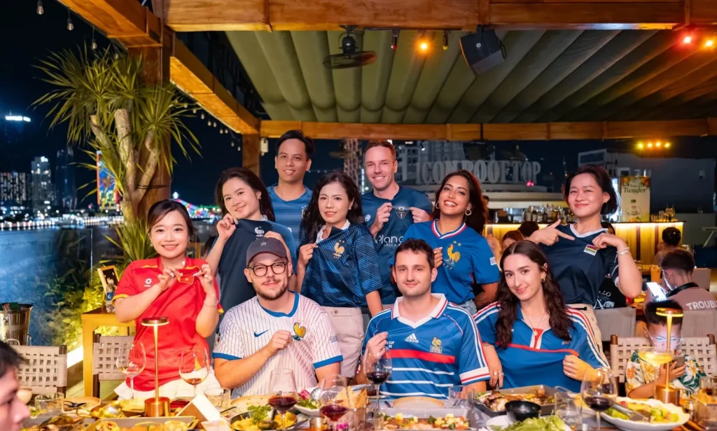 Group photo of the Sutunam team at an evening event